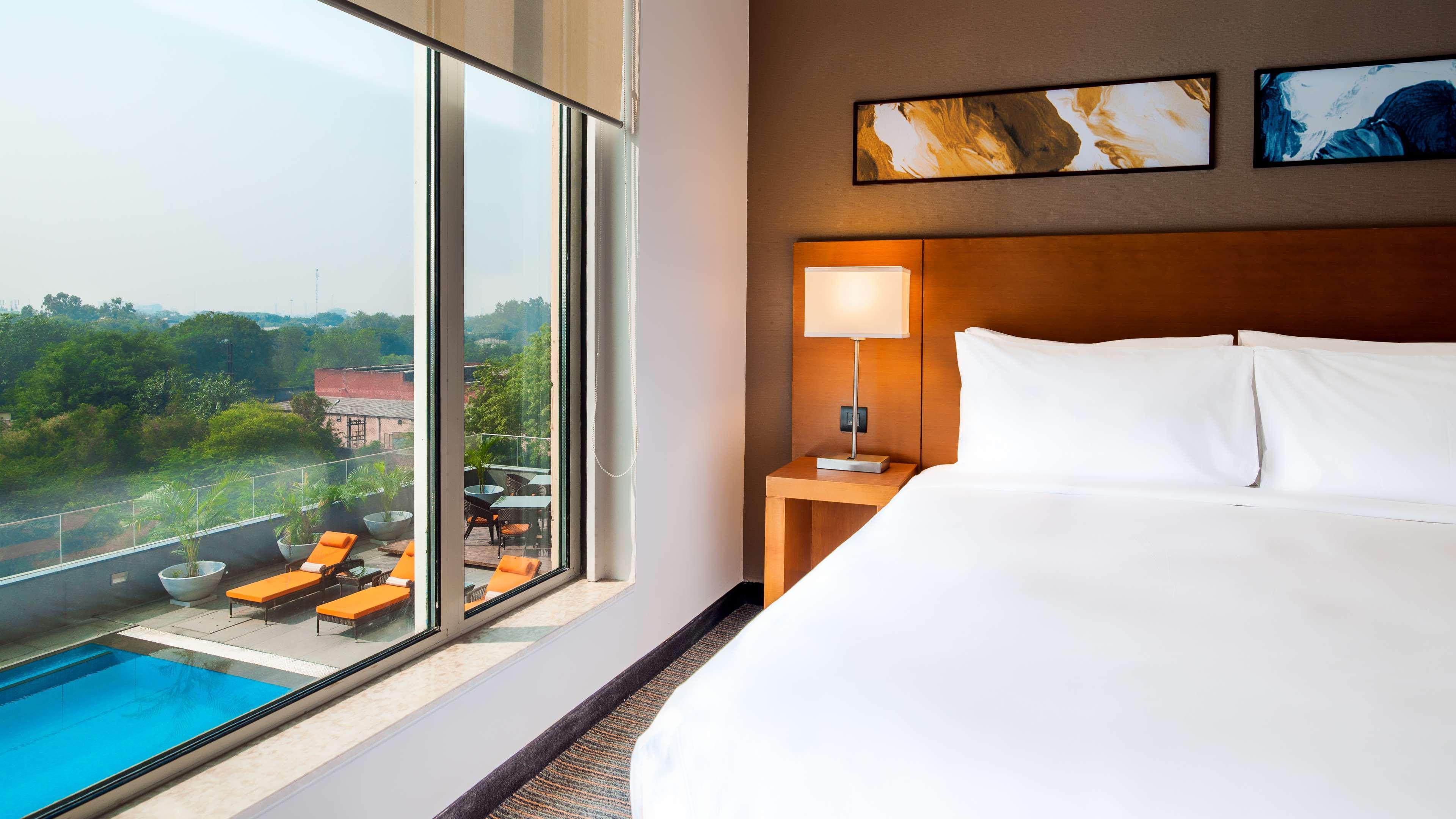 Hyatt Place Gurgaon Udyog Vihar Esterno foto A guest room at the hotel