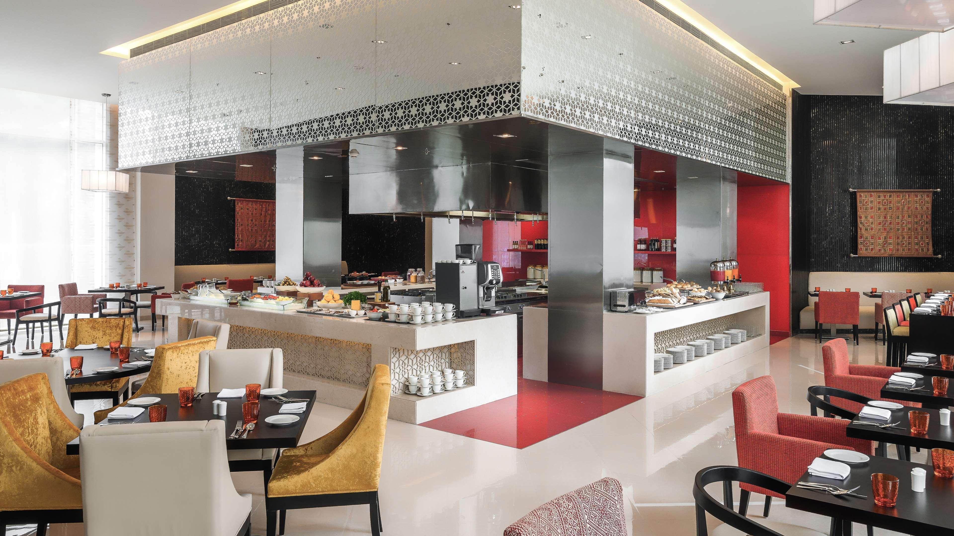 Hyatt Place Gurgaon Udyog Vihar Esterno foto The restaurant