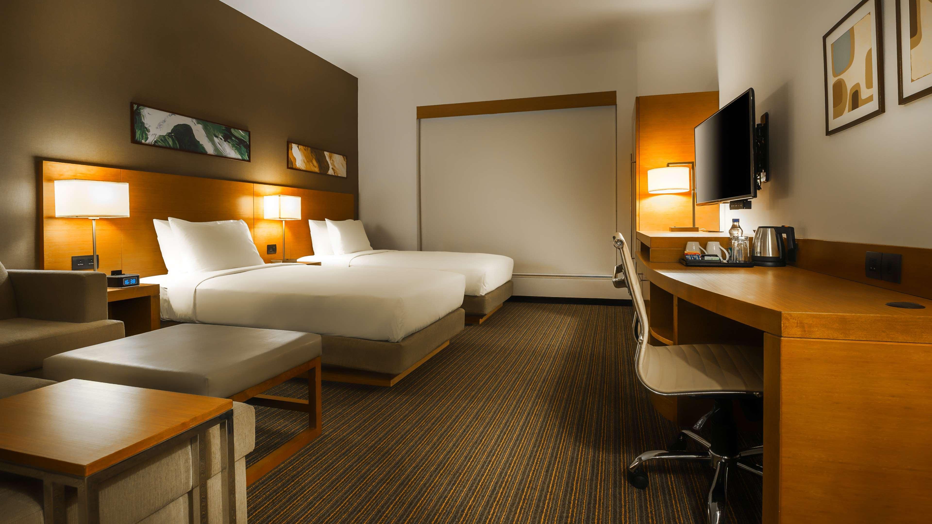 Hyatt Place Gurgaon Udyog Vihar Esterno foto A typical room at the Holiday Inn Express